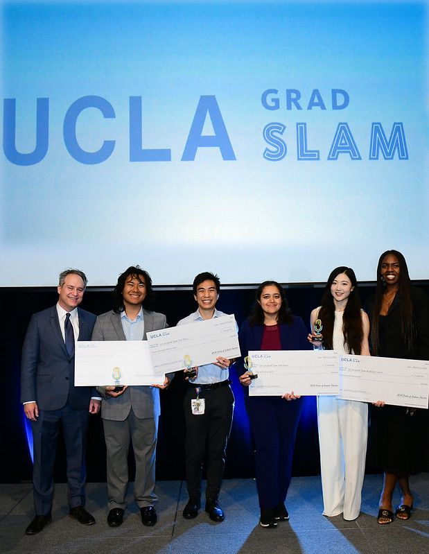 2026 UCLA Grad Slam winners Christian Gerard Capuno, Noah Yan, Shreya Kordale, and Jiaao Liu stand with Dean and Vice Provost Brian Kite and GSA President Naomi Hammonds, celebrating top research presentations across disciplines.